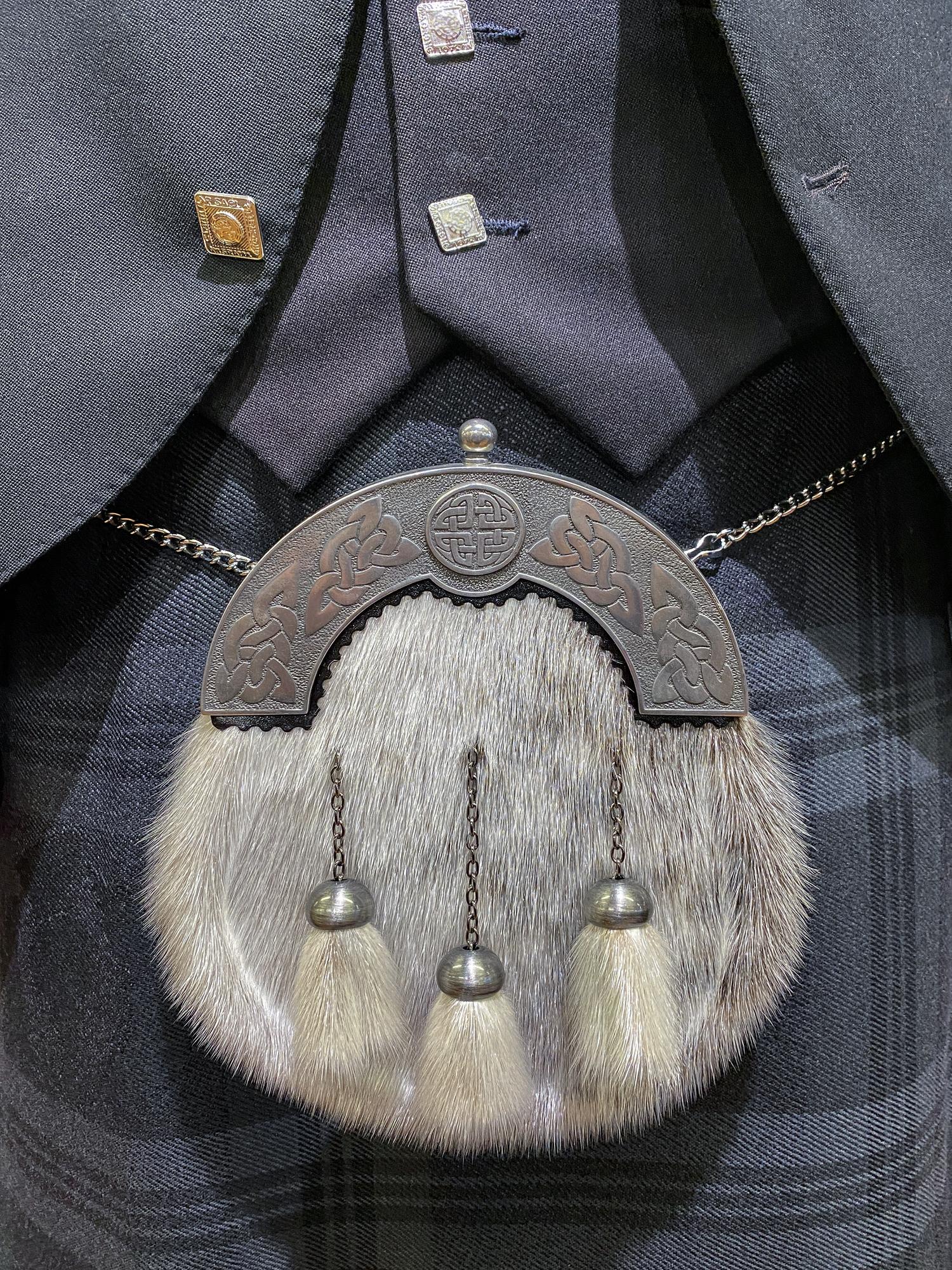 Embroidered jacket cuff with tonal threads
